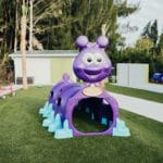 Purple Worm Playground Toy at Bloom Academy Purple Worm Playground Toy at Bloom Academy